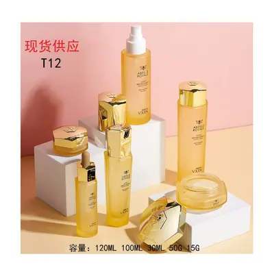 Bộ chai + hũ thủy tinh vàng trong nắp vàng T12 – mã NXG0476