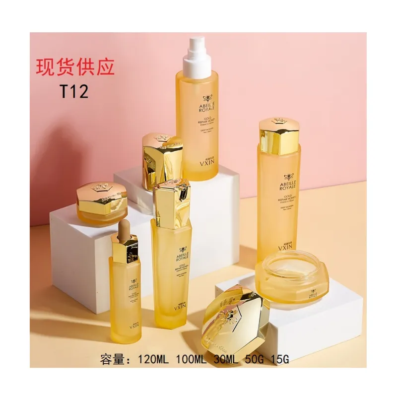 Bộ chai + hũ thủy tinh vàng trong nắp vàng T12 – mã NXG0476