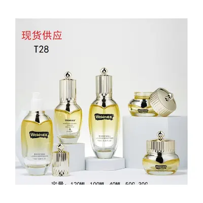 Bộ chai + hũ thủy tinh vàng trong nắp vàng T28 – mã NXG0501
