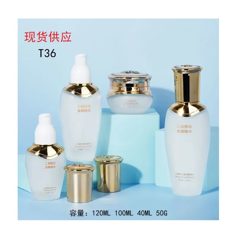 Bộ chai + hũ thủy tinh trắng mờ nắp vàng T36 – mã NXG0502