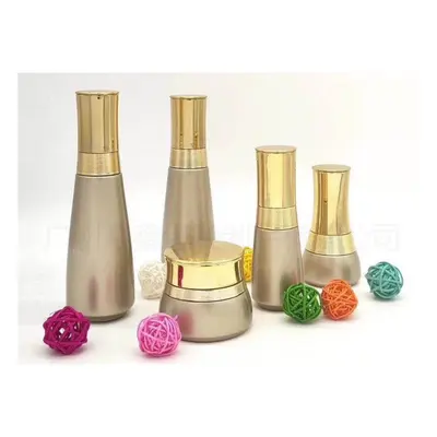 Bộ chai + hũ thủy tinh vàng champagne nắp vàng – mẫu 2 – mã NXG0536