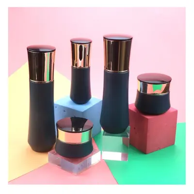 Bộ chai + hũ thủy tinh đen nhám nắp vàng hồng – mã NXG0542