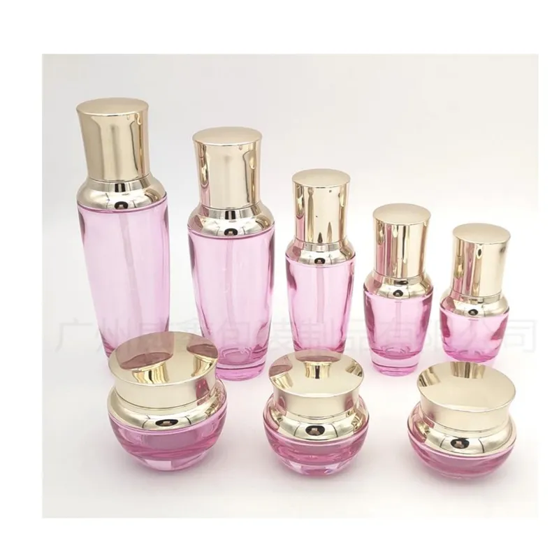 Bộ chai + hũ thủy tinh hồng nắp vàng – mã NXG0552