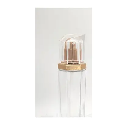 Bộ chai + hũ thủy tinh trong đa giác nắp vàng hồng – mã NXG0556