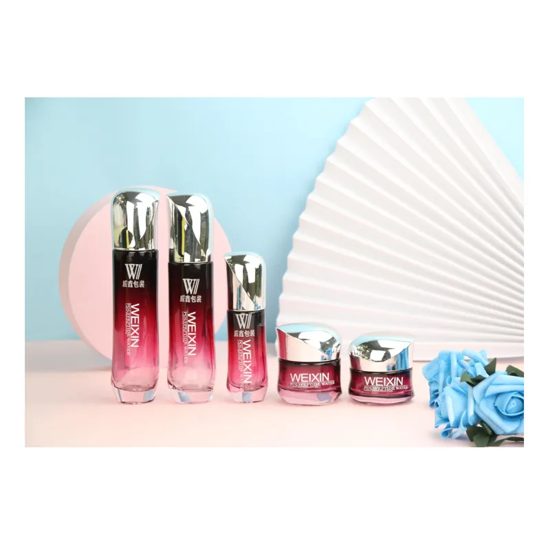 Bộ chai + hũ thủy tinh đỏ hồng nắp bạc – mã NXG0563