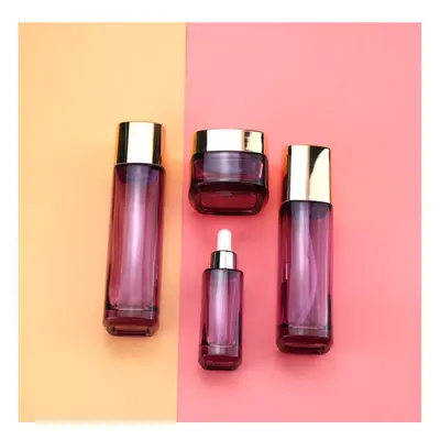 Bộ chai + hũ thủy tinh hồng tím nắp vàng – mã NXG0573