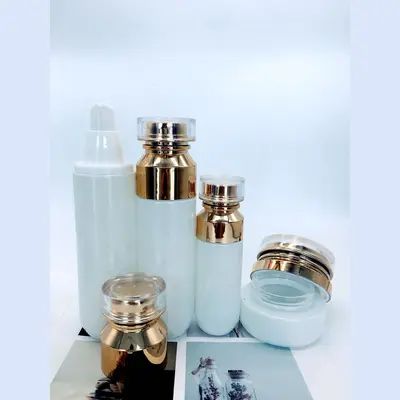 Bộ chai xịt thủy tinh + hũ kem trắng sứ nắp vàng hồng 120ml – ảnh 2