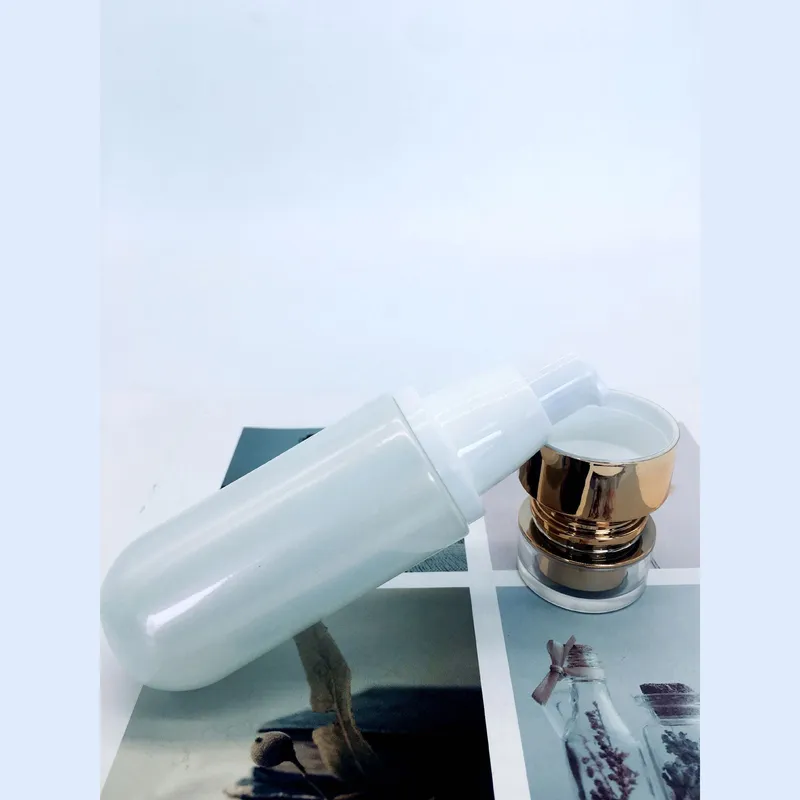 Bộ chai xịt thủy tinh + hũ kem trắng sứ nắp vàng hồng 120ml – mã NXG0601