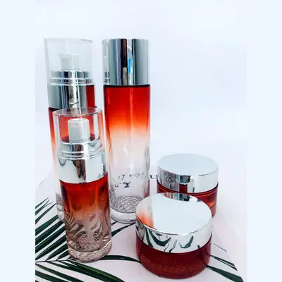Bộ chai xịt thủy tinh + hũ kem đỏ chuyển trong nắp bạc 120ml – ảnh 1
