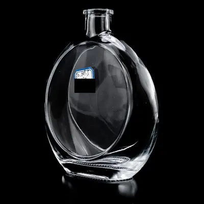 Chai rượu thủy tinh dẹt oval vòng nổi 500ml – mã NXW0014