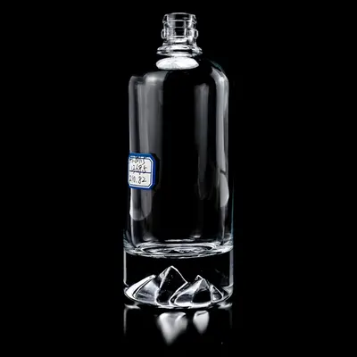 Chai rượu thủy tinh trụ tròn đáy núi băng 550ml – mã NXW0016