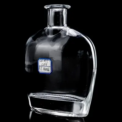 Chai rượu thủy tinh dẹt vai tròn 500ml – mẫu 3 – mã NXW0062
