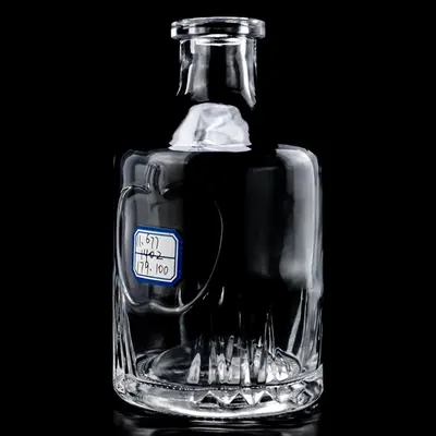 Chai rượu thủy tinh trụ tròn đáy vân tia 700ml – mã NXW0077