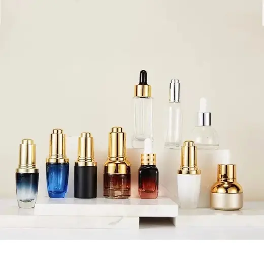 Chai serum nhỏ giọt thủy tinh xanh, hổ phách và trong suốt